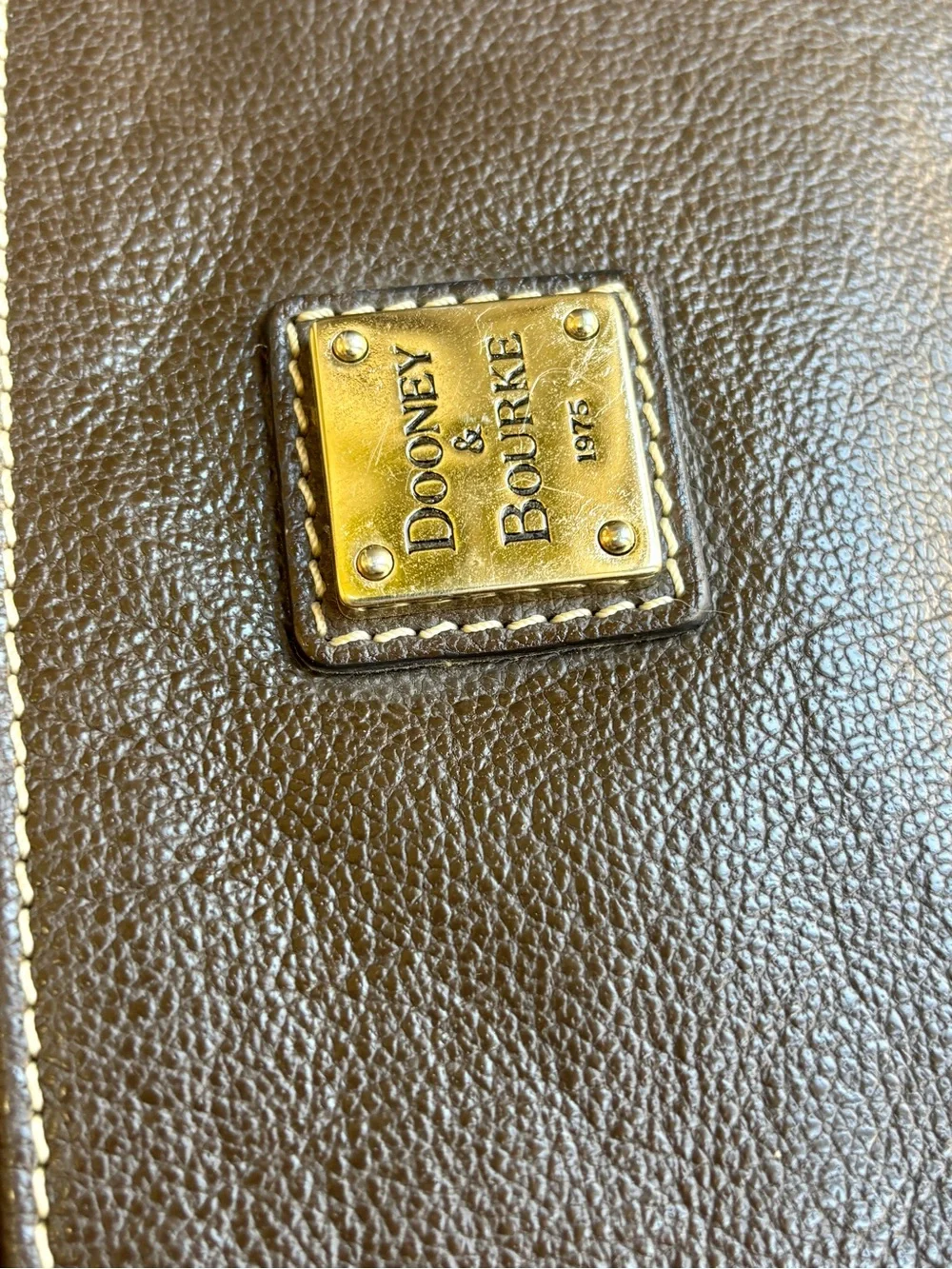 Dooney and Burke brown pebbled Crossbody with gold hardware adjustable strap